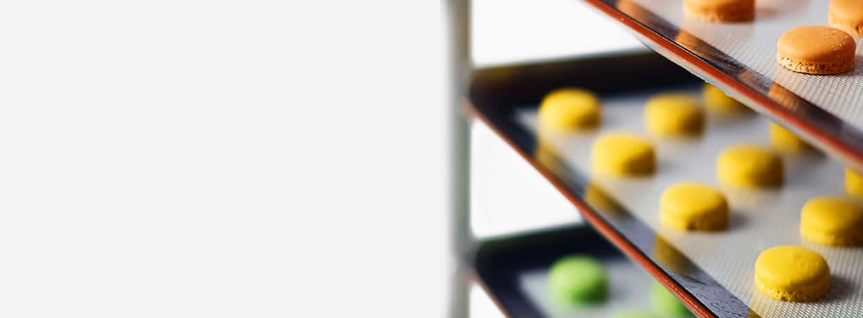Blurred macaron trays