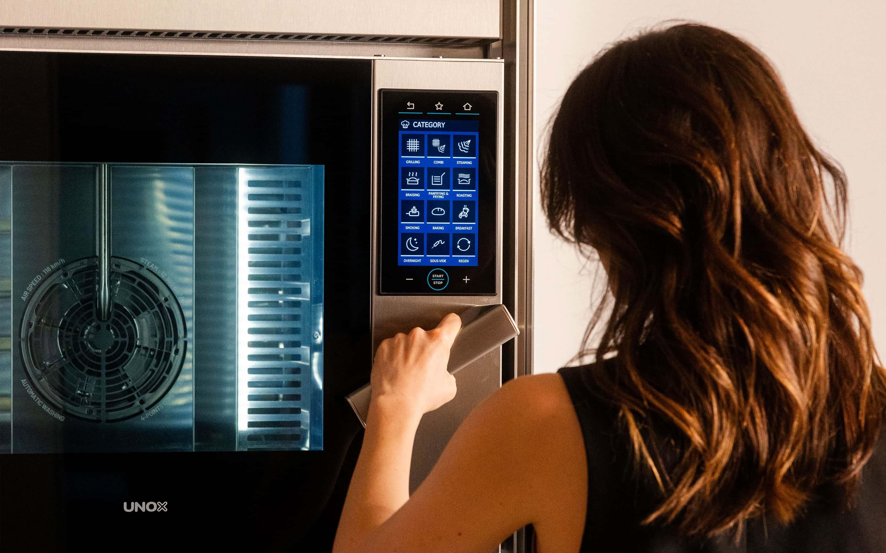 Unox Casa's Model 1S smart oven within a high-end designer penthouse located in Milan