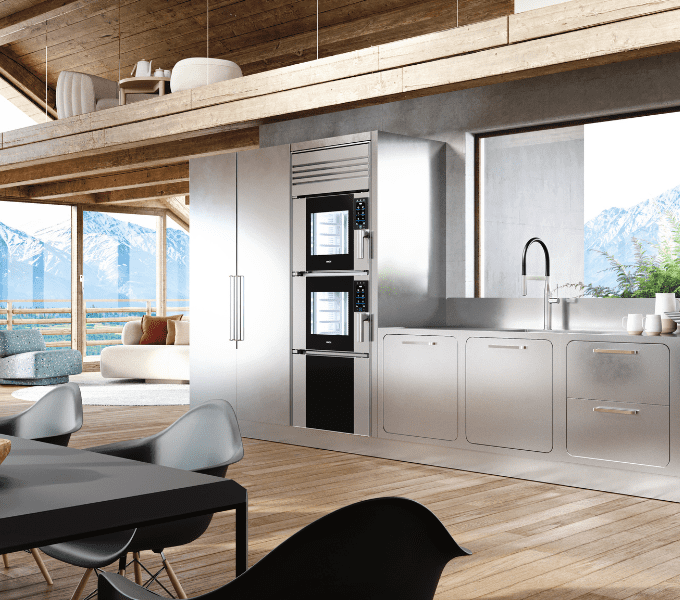 Model 1 di Unox Casa inserito in una moderna cucina interamente in acciaio inossidabile
